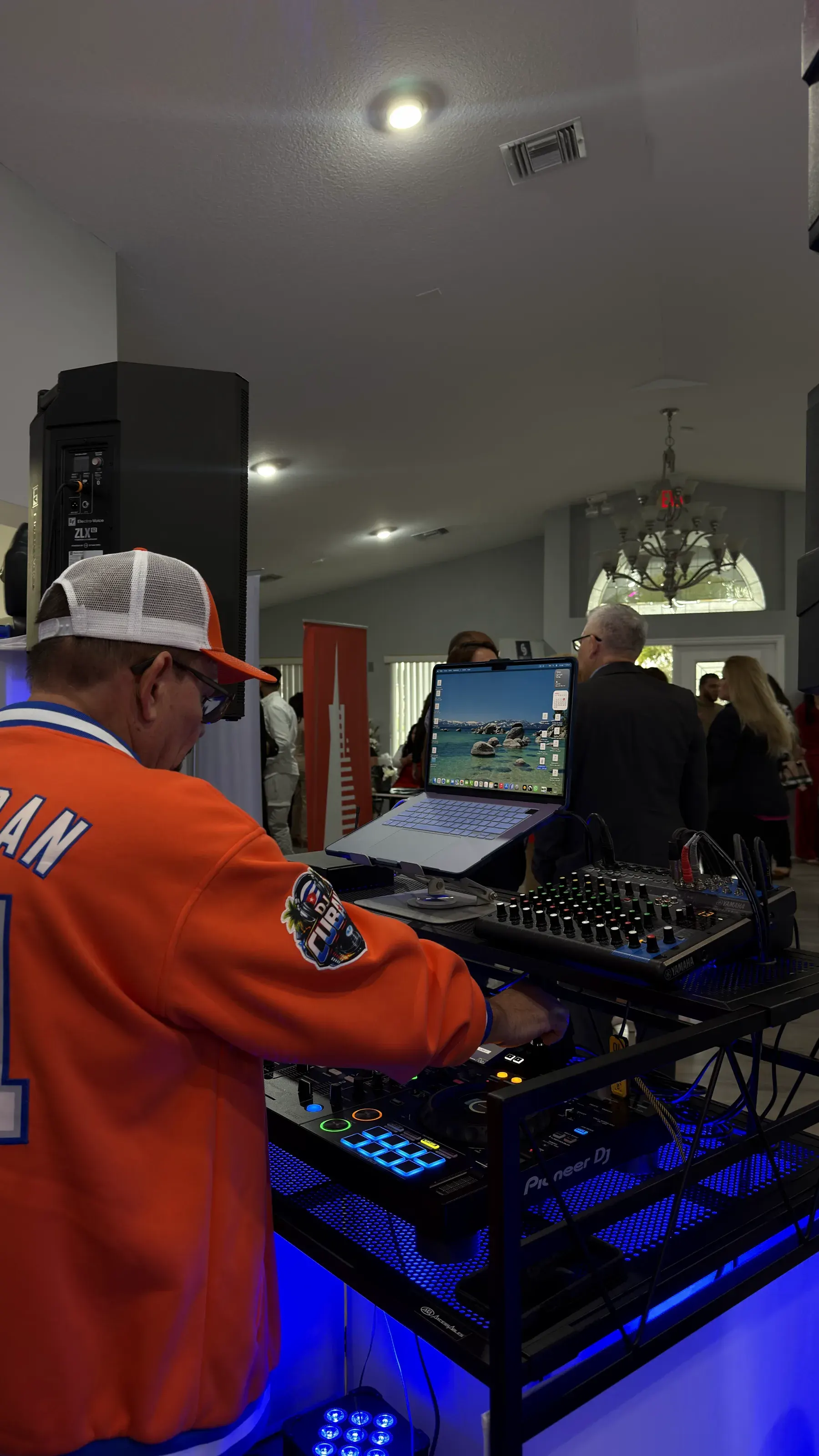 DJ Cuban at the booth with the Pioneer controller
